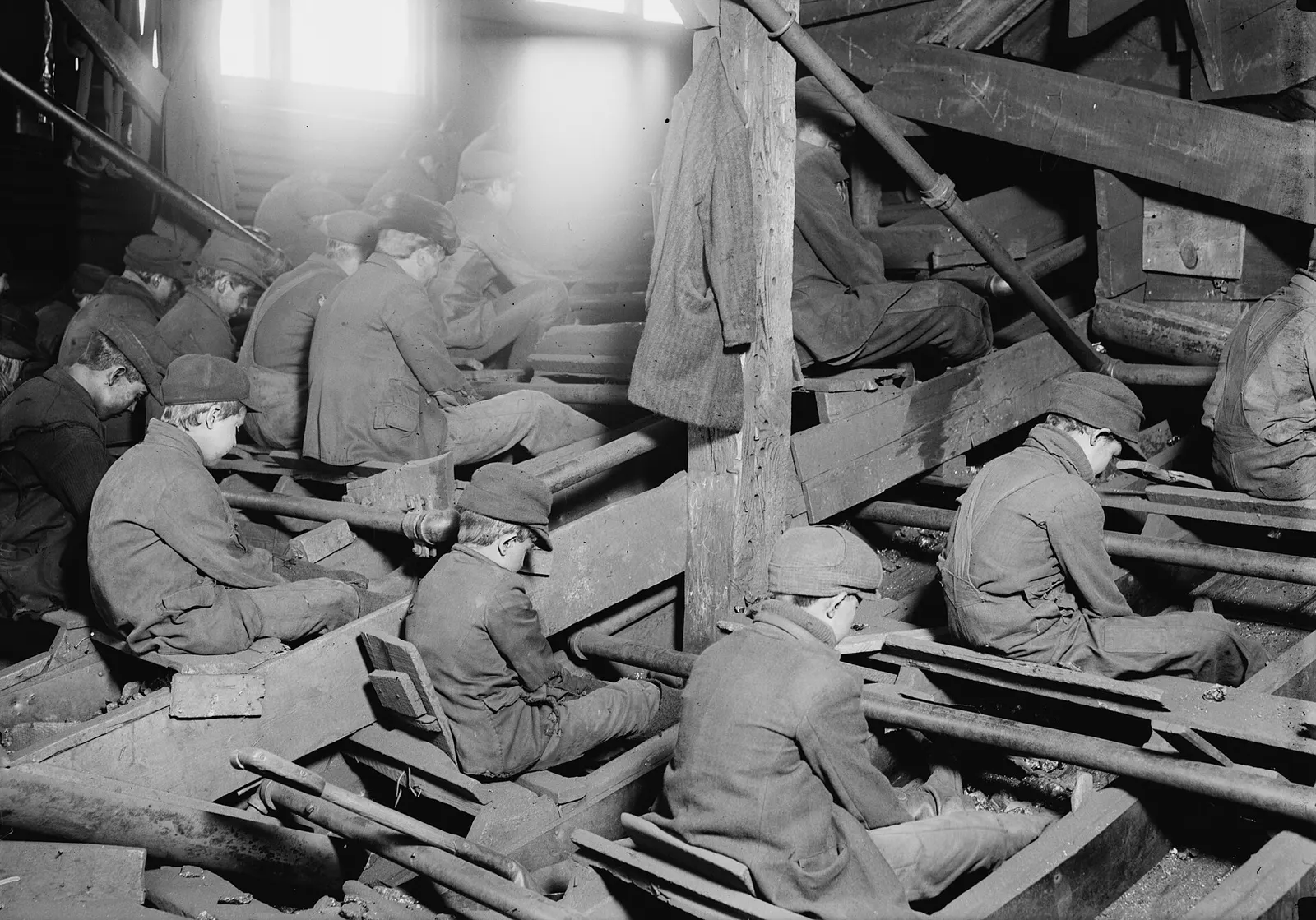 Breaker boys sorting coal inside an anthracite coal breaker near South Pittston, Pennsylvania, photographed by Lewis Hine in 1911