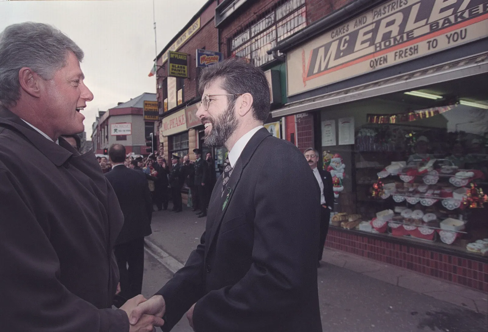 President Bill Clinton greets Sinn Féin president Gerry Adams outside a business at East Belfast Enterprise Park
